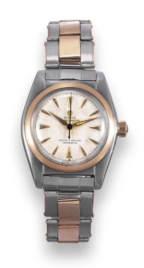 Steel and Pink Gold Bubble Back Rolex, "Oyster Perpetual Officially Certified Chronometer", case No. 619378, Ref. 5011. Made circa 1948. Fine and rare, tonneau-shaped, center seconds, self-winding, water-resistant, stainless steel and pink gold wristwatch with a stainless steel and pink gold Rolex Oyster riveted bracelet with deployant clasp signed by Gay Frères.