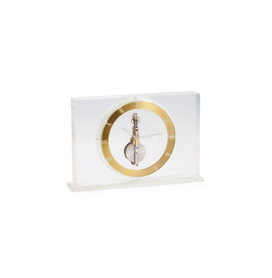 JAEGER LECOULTRE DESK CLOCK Jaeger-Le Coultre, Swiss, circa 1960. Fine, gilt brass eight-day going skeletonized desk clock.