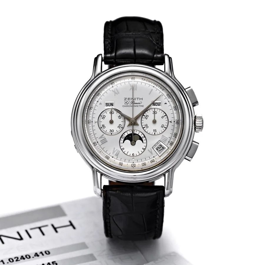 ZENITH EL PRIMERO CHRONOMASTER STEEL Zenith, "El Primero, Chronometre", Ref.0240. 410. Made in the late 1990's. Very fine, self-winding, water resistant, stainless steel wristwatch with square button chronograph, registers, tachymeter, moon phases, triple date and a stainless steel Zenith buckle. Accompanied by a guarantee.