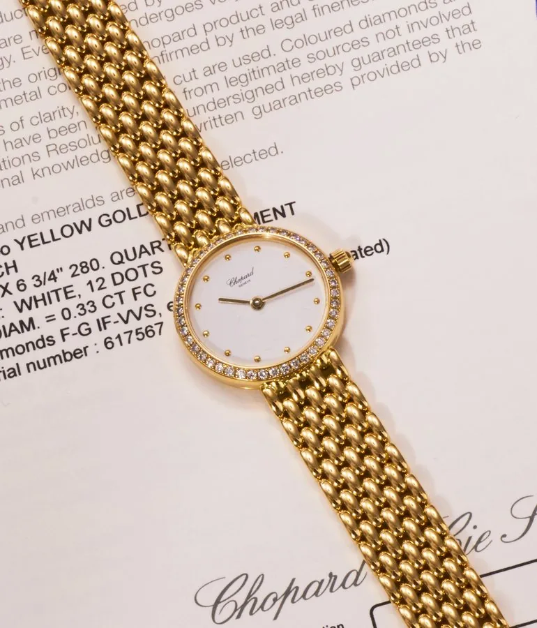 Chopard - Ref. 105911-0001-YDBL, white dial, diamond-set bezel, integrated bracelet; 18K yellow gold and diamonds (“New Old Stock”)