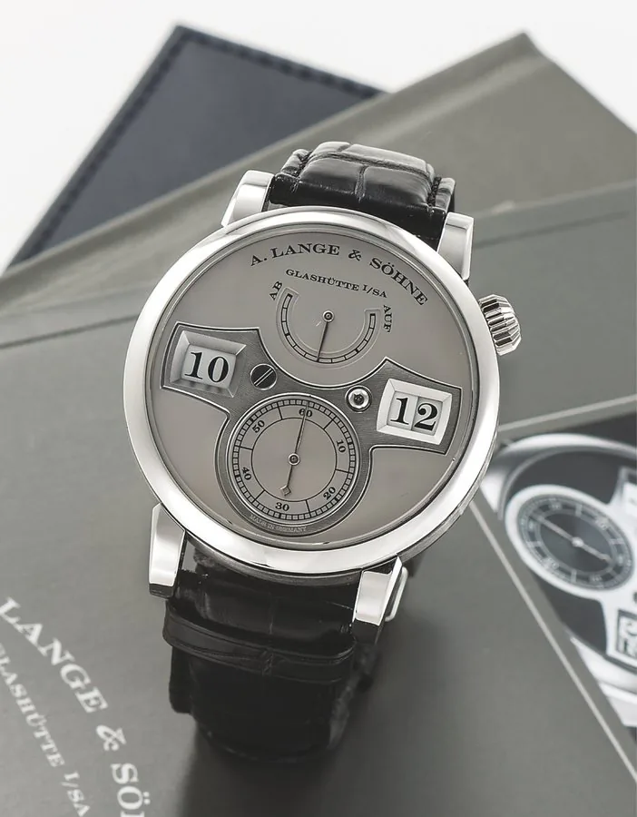 A. LANGE & SÖHNE REF. 140.025 ZEITWERK PLATINUM Lange & Söhne, Glashütte i./Sa., 'Zeitwerk', limited edition No.151/200. No. 86711, case No. 196758, Ref. 140.025. Made in a limited series of 200 pieces in 2009. Very fine and rare, platinum wristwatch with hour and minute indicator, power reserve indicator an platinum A. Lange & Söhne deployant clasp. Accompanied by the original fitted box, guarantee, instruction booklet, and cloth.