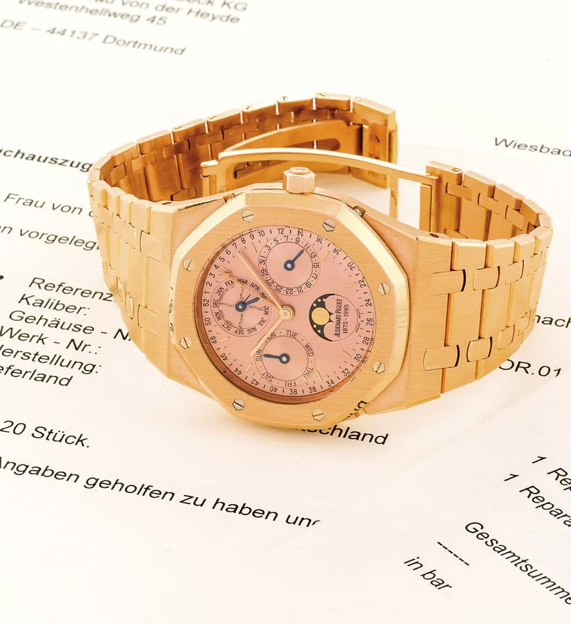 AUDEMARS PIGUET ROYAL OAK QUANTIÈME PERPÉTUEL AUTOMATIQUE, 120TH ANNIVERSARY LIMITED EDITION Audemars Piguet, Genève, "Royal Oak - Quantième Perpétuel Automatique", movement No. 438015, case No. D68785, Ref. 25810OR. Made in a limited edition of 120 pieces in 1995. Very fine and rare, octagonal, self-winding, water-resistant, 18K pink gold wristwatch with perpetual calendar, phases and age of the moon and an 18K pink gold Audemars Piguet bracelet with concealed deployant clasp.