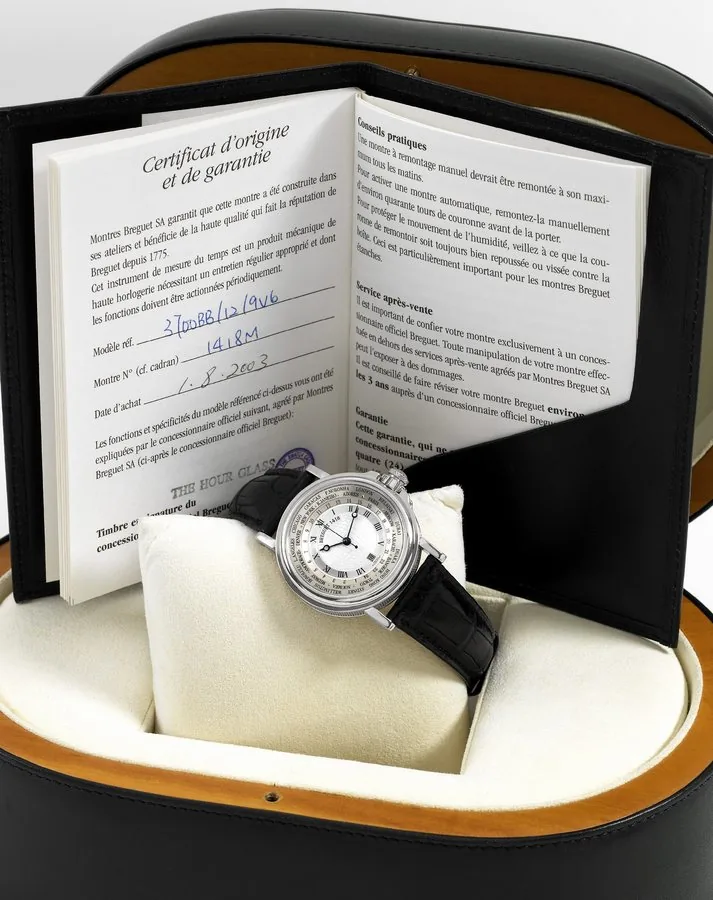 Breguet - White Gold ' World Time - Marine Breguet, 'Hora Mundi Marine," No. 1418, Ref. 3700. Made circa 2001, sold January 8th, 2003. Very fine, world time, center seconds, self-winding, water-resistant, 18K white gold wristwatch with date and an 18K white gold Breguet deployant clasp. Accompanied by the original Breguet box, certificate of origin and instruction manual.