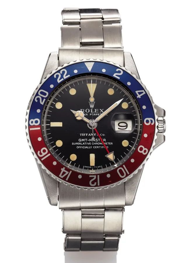 ROLEX REF. 1675 GMT MASTER RETAILED BY TIFFANY & CO STEEL Rolex Oyster Perpetual, GMT Master, Superlative Chronometer, Officially Certified, case No. 2009540, Ref. 1675. Made in 1968. Fine, two time zone, center seconds, self-winding, water- resistant, stainless steel wristwatch with date, 24-hour bezel and hand and a stainless steel Rolex oyster bracelet.