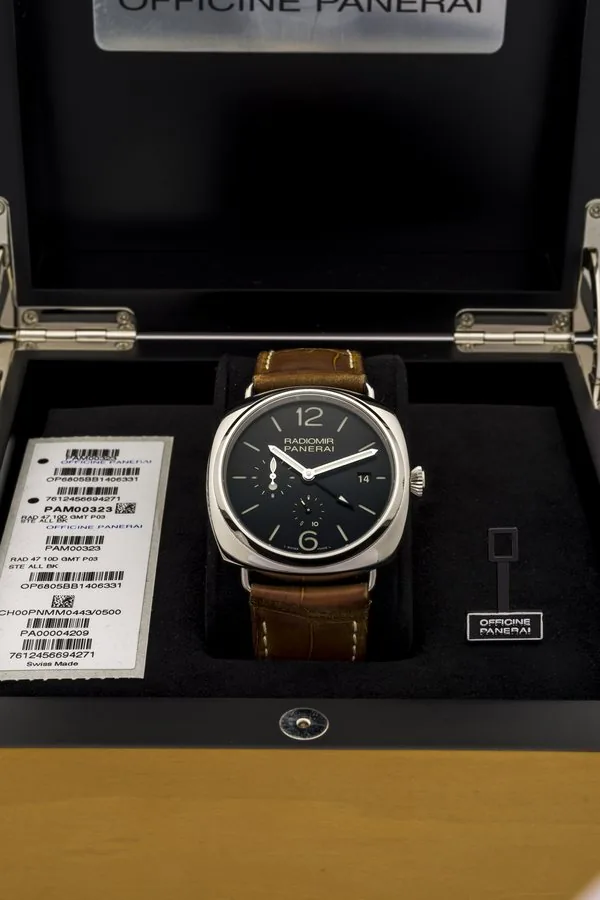 PANERAI REF. OP 6805 PAM 323 RADIOMIR 10 DAYS GMT STEEL Officine Panerai GMT, 10 Days, No. M 443 / 500, case No. BB 1406331, Ref. OP 6805. Made in a limited edition of 500 pieces in 2010, sold in November 2011. Very fine, large, cushion-shaped, water resistant, two time zone, self-winding stainless steel wristwatch with date, 10 day power reserve indications, and a stainless steel Panerai buckle. Accompanied by the original wooden box, guarantee and instruction booklet.