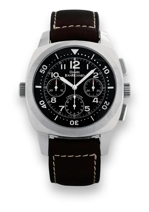 Daniel Jean Richard, Chronoscope Daniel Jean Richard, Chronoscope, No. 0286, Ref. 25030. Made in 2000. Fine, cushion-shaped, self-winding, stainless steel wristwatch with square button chronograph, registers, two crowns and a stainless steel Jean Richard buckle. Accompanied by the original box and guarantee.