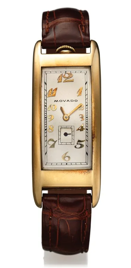 MOVADO REF. 44009 POLYPLAN YELLOW GOLD Movado, "Polyplan," movement No. 401563, case No. 401743, Ref. 44009. Production of this reference started in 1912. Fine and very rare, rectangular curved, 14K yellow gold wristwatch.
