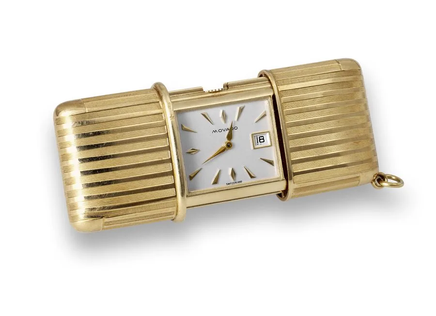 Movado ' Yellow Gold Baby Ermeto Movado, No. 585067. Made in the 1950s. Fine and rare, rectangular, yellow gold "Ermeto" keyless self-winding purse watch. To be sold without reserve