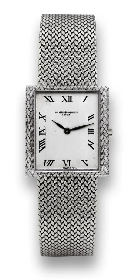 VACHERON & CONSTANTIN RECTANGULAR, WHITE GOLD Vacheron & Constantin, Genève, No. 600836,case No. 431700, Ref. 7255. Made in the 1960s. Fine, rectangular, extra-thin, 18K white gold wristwatch with an 18K white gold integral "à épis" bracelet. To be sold without reserve