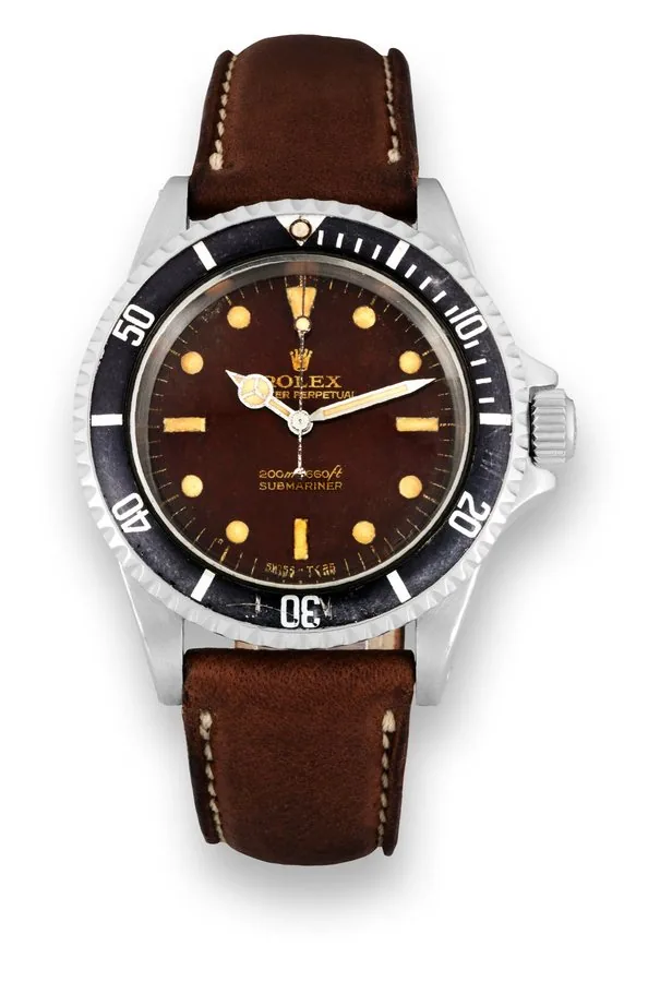 Rolex Ref. 5513 Tropical Gilt Dial Rolex, 'Oyster Perpetual, 200 m/600ft, Submariner', case No. 1775615, Ref. 5513. Made in 1967. Fine and rare, center seconds, self-winding, water-resistant, stainless steel diver's wristwatch with a stainless steel Rolex buckle.