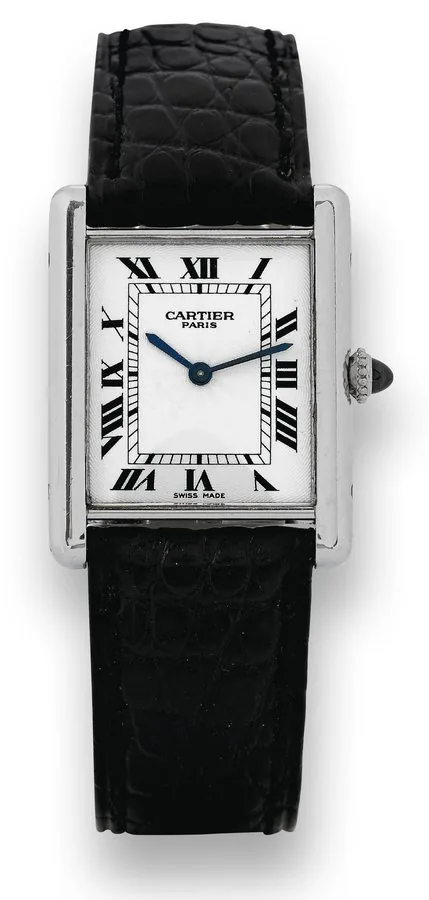 Platinum Tank Mécanique Cartier, Paris, Tank, case No. C129787, Ref. 1601. Made in the 1980s. Very fine and elegant, rectangular, thin, platinum wristwatch with an 18K white gold Cartier deployant clasp. Accompanied by the original warranty and instruction booklet.
