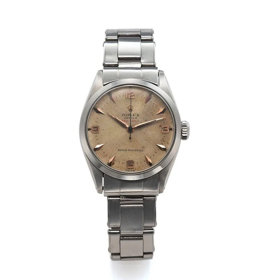 ROLEX, REF. 6444 RED DEPTH STEEL Rolex, Oyster, Shock-Resisting, case No. 115900, Ref. 6444. Made circa 1954. Fine, tonneau-shaped, center seconds, water-resistant, stainless steel wristwatch with a stainless steel riveted Rolex bracelet.