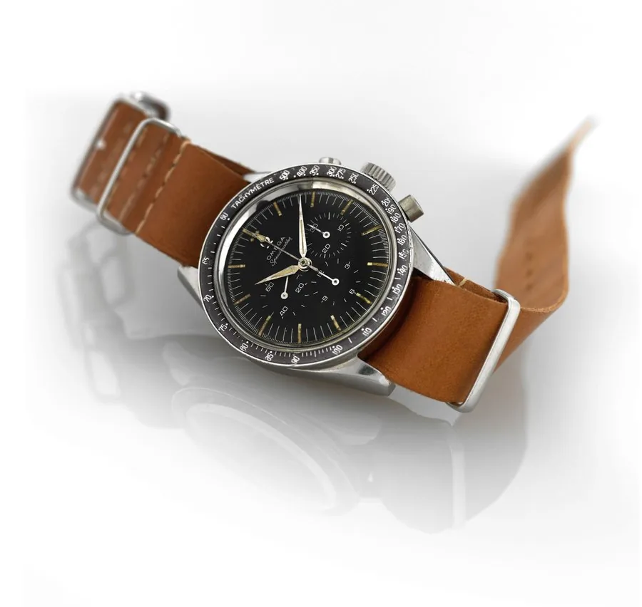 OMEGA REF. 2998 SPEEDMASTER Omega, Speedmaster, No. 18946947, Ref. 2998-5. Made circa 1962. Fine, water-resistant, stainless steel wristwatch with round button chronograph, registers and tachometer.