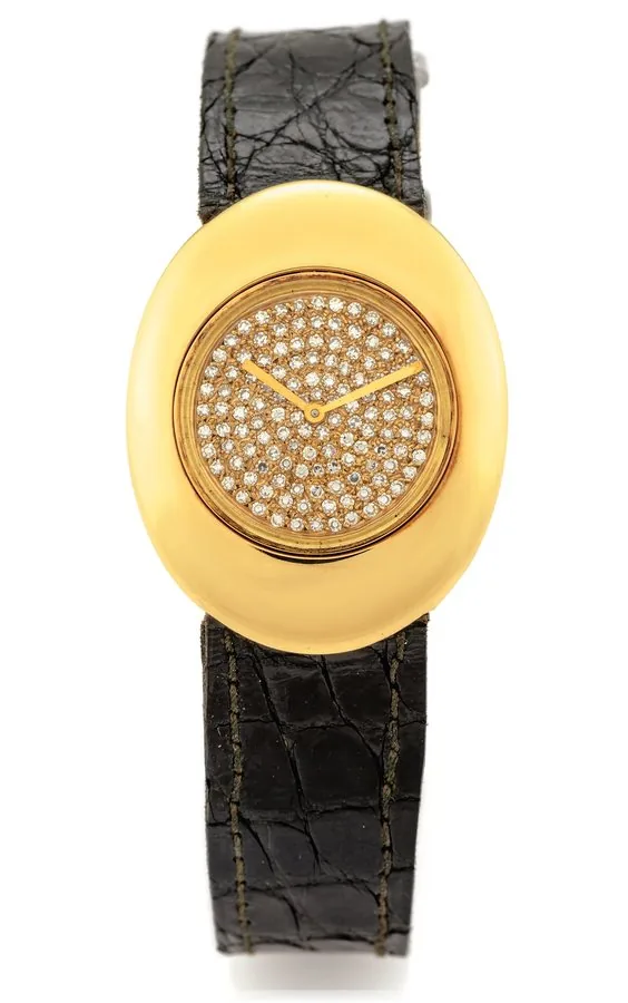 BOUCHERON & OMEGA YELLOW GOLD Boucheron, Paris, movement made by Omega, No. 33913897, case No. 21465. Made in the 1960's. Fine and rare, oval and diamond 18K yellow gold wristwatch with an 18k yellow gold buckle. Case signed Boucheron, movement signed Omega.