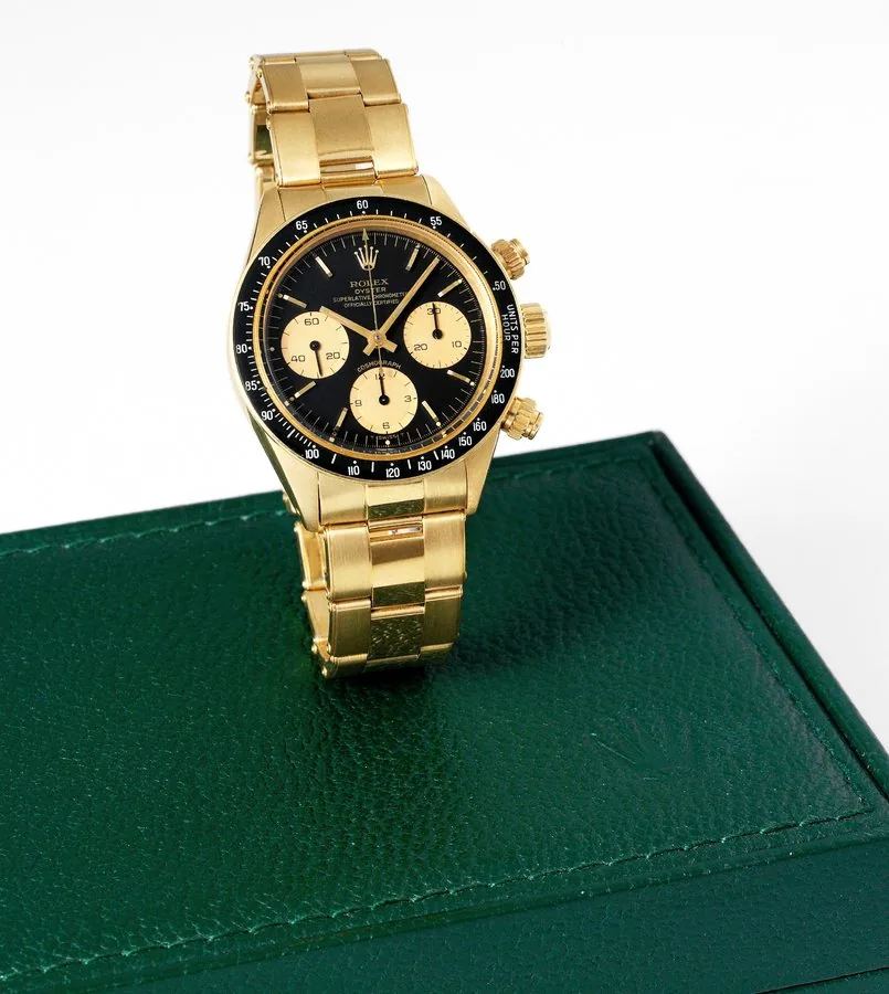 Rolex 6263 Gold Cosmograph Rolex, 'Oyster, Superlative Chronometer, Officially Certified, Cosmograph', case No. 5996795, Ref. 6263. Made circa 1979. Very fine and rare, water-resistant, 18K yellow gold chronometer wristwatch with round button chronograph, registers, gold black bezel with tachometer graduated to 200 units per hour and an 18K yellow gold Rolex Oyster riveted bracelet with deployant clasp. Accompanied by a Rolex box.