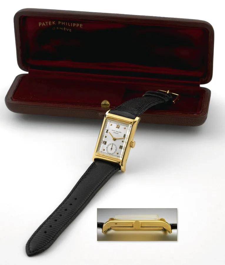 Patek Philippe & Cie, Genève, No. 971115, case No. 653032, Ref. 1493. Made circa 1948. Fine and rare, 18K yellow gold rectangular wristwatch with period Patek Philippe box.