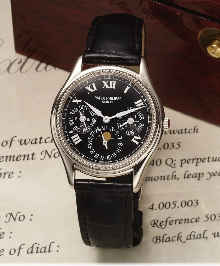 PATEK PHILIPPE REF 5038 LIMITED EDITION WHITE GOLD Patek Philippe, Genève, movement No.776035, case No. 4005003, Ref. 5038G. Made in a limited edition of 500 pieces in 1996, sold March 7th, 1997. Very fine and rare, self-winding, 18K white gold wristwatch with perpetual calendar, moon phases and an 18K white gold Patek Philippe deployant clasp. Accompanied by the original fitted box and the Extract from the Archives.