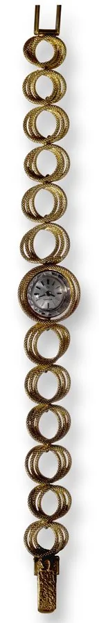 Interlaced Circles Omega, No. 23209941, case No. 59338, Ref. 7183. Made in the 1960s. Fine and elegant, 18K yellow gold lady's wristwatch with integral 18K yellow gold bracelet. To be sold without reserve