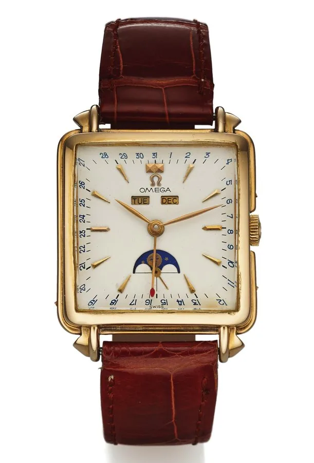 OMEGA REF. 3944 COSMIC YELLOW GOLD Omega, No. 13647456, case No. 132016, Ref. 3944. Made circa 1951. Very fine and rare, square, astronomic, 18K yellow gold wristwatch with triple date, moon phases and a gold plated stainless steel deployant clasp.