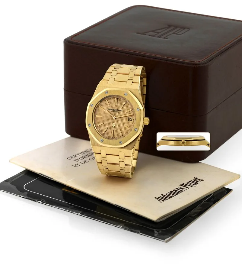 AUDEMARS PIGUET ROYAL OAK JUMBO, 18K YELLOW GOLD Audemars Piguet, 'Royal Oak Jumbo, Automatic', No. 628, No. 225248, case B57263, Ref. 5402BA. Made in 1980. Fine and very rare, octagonal, self-winding, water-resistant, 18k yellow gold wristwatch with date and an 18k yellow gold Audemars Piguet bracelet with deployant clasp. Accompanied by the original blank certificate, booklet and fitted box and an Audemars Piguet Certificate of Origin.