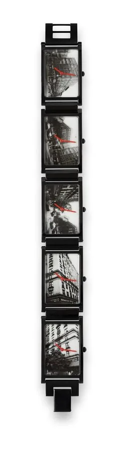 Movado - Andy Warhol ' Times / 5 Movado, Andy Warhol, "Times / 5," No. 22/ 250. Made in a limited edition of 250 pieces in 1988. Fine and unusual, "World Time," rectangular, PVD coated stainless steel wristwatch with five dials representing five different views of New York for five different time zones.