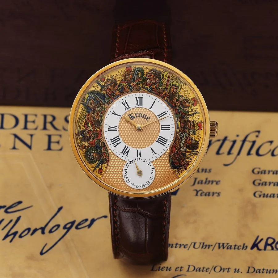 SVEND ANDERSEN REF. KA8631 KRONE ART OF WAR YELLOW GOLD Andersen, Genève, Krone, Art of War, No. 07/28, Ref. KA 8631. Made in a limited edition of 28 pieces circa 2005. Very fine and unusual, large, 18K yellow gold wristwatch with date, "Art of War" dial and an 18K yellow gold Krone buckle. Accompanied by the original fitted box and Certificate of Origin.