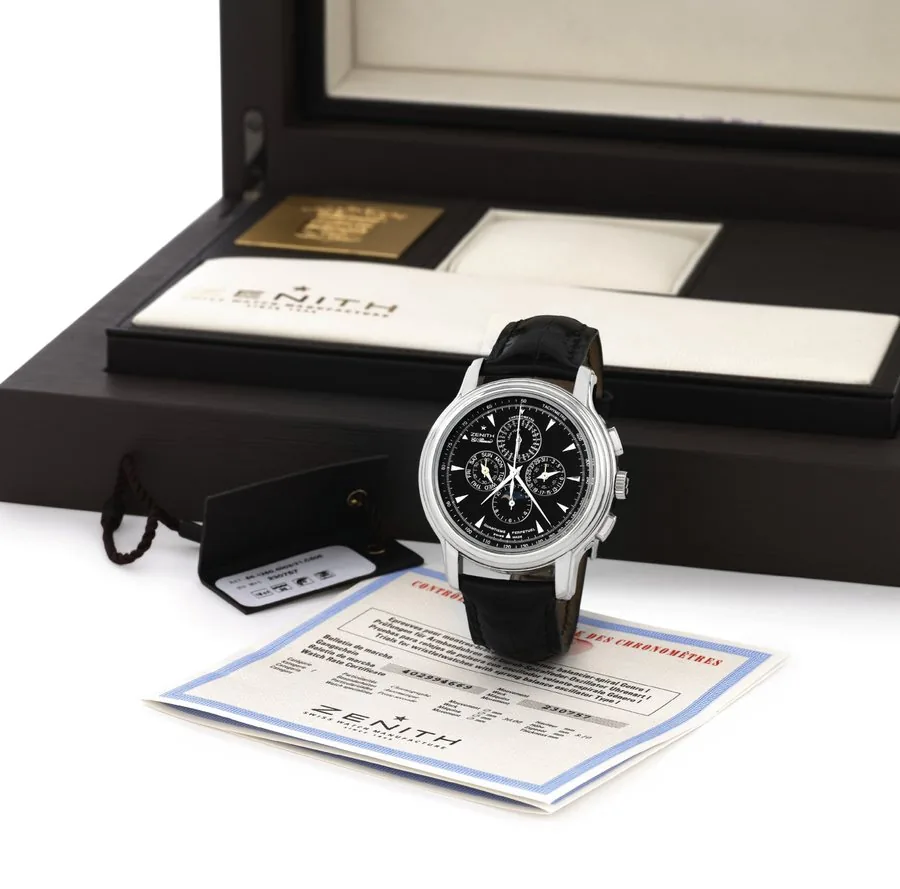 ZENITH ACADEMY MILLÉSIME 2008 PERPETUAL CALENDAR CHRONOGRAPH NO.1 Zenith, EL Primero Academy Millesime 2008, Ref. 65 1260 4003. No.1. Made in 2008. Very fine and rare, oversized, self-winding, water-resistant, 18K white gold wristwatch with oval-button chronograph, registers, perpetual calendar, tachometer, phases of the moon and an 18K white gold Zenith double deployant clasp. Accompanied by the original fitted box, Chronometer Certificate and instruction booklet.