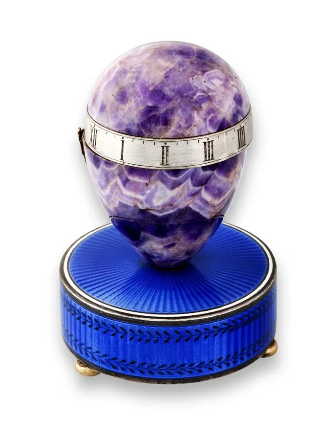 Amethyst & Enamel Egg Clock Black, Starr & Frost, (New York). Swiss made circa 1920. Fine and rare, amethyst, silver and enamel, 8-day going, keyless, egg-form cercles tournant desk clock.