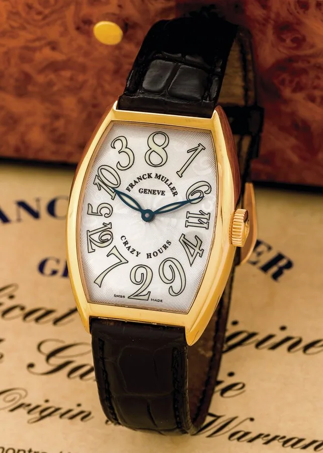 FRANCK MULLER CRAZY HOURS PINK GOLD Franck Muller, Geneve, "Crazy Hours", case No. 942, Ref. 5850 CH. Sold December 1st, 2007. Fine and unusual, tonneau-shaped, water-resistant, self-winding, 18K pink gold wristwatch with non sequential Arabic numerals jump hours and an 18K pink gold Franck Muller buckle. Accompanied by the certificate and the original fitted box.