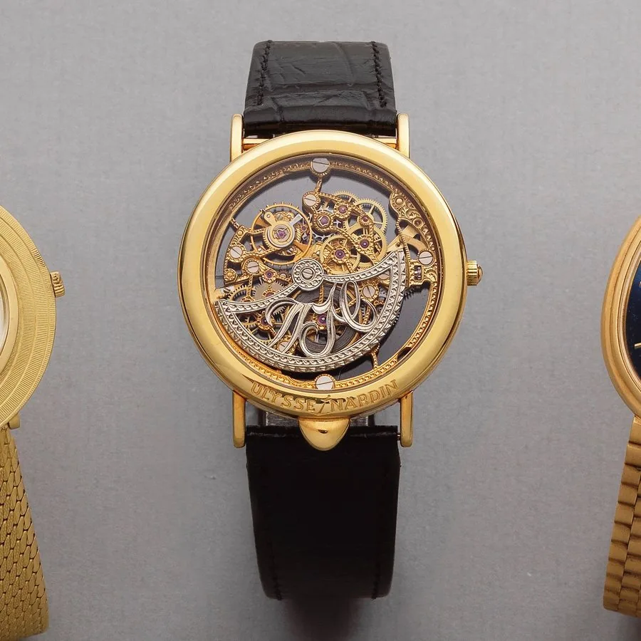 Ulysse Nardin. An unusual 18K gold inverted automatic skeletonised wristwatch Ref: 141 28, Circa 1990