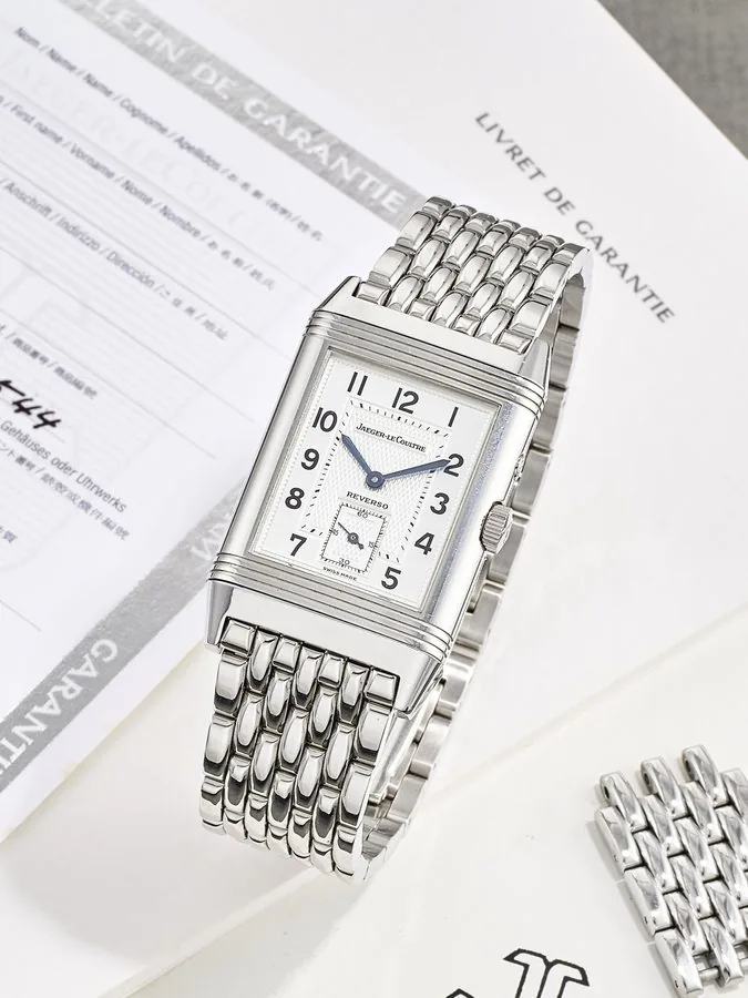JAEGER-LECOULTRE | REVERSO, REF.270.8.54, A STAINLESS STEEL REVERSIBLE DUAL TIME ZONE BRACELET WATCH WITH DAY/NIGHT INDICATION, CIRCA 1995