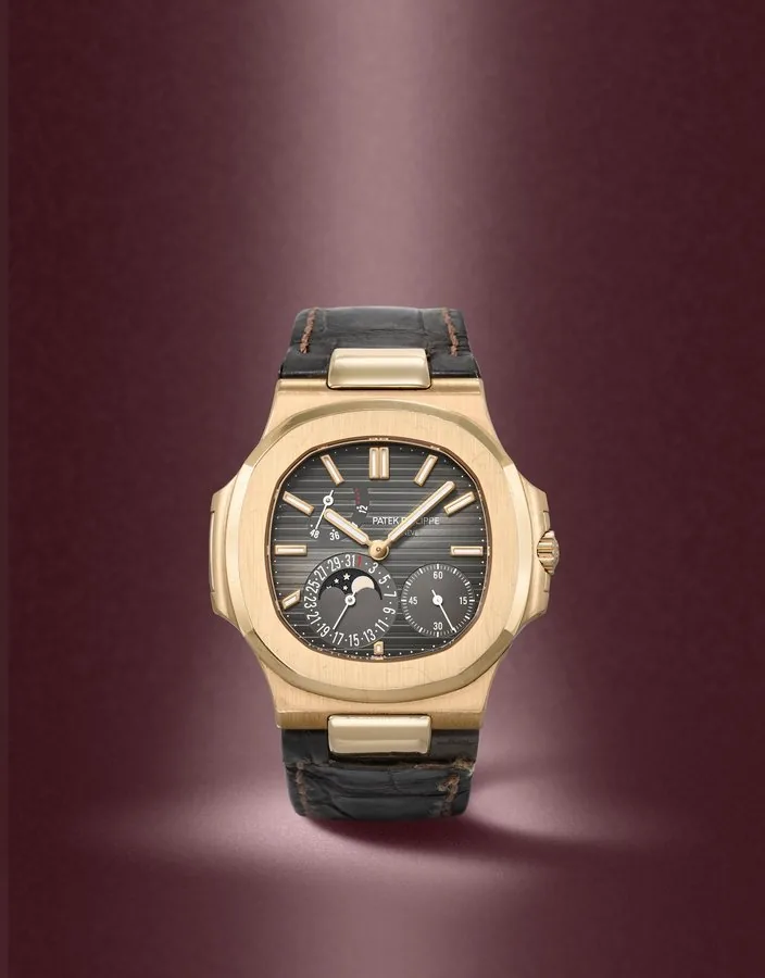 Patek Philippe. An 18K rose gold automatic calendar wristwatch with moon phase and power reserve Nautilus, Ref: 5712R, Circa 2010