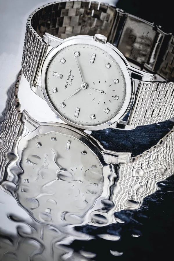 PATEK PHILIPPE. A VERY RARE PLATINUM AND DIAMOND-SET WRISTWATCH WITH 18K WHITE GOLD BRACELET SIGNED PATEK PHILIPPE, GENEVE, REF. 2484, MOVEMENT NO. 745'969, CASE NO. 692'787, MANUFACTURED IN 1956