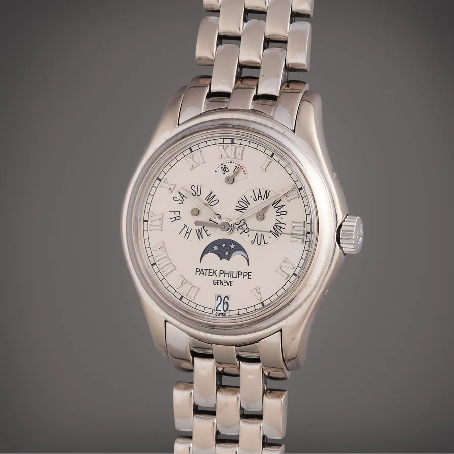 Reference 5036/1 | A white gold automatic annual calendar wristwatch with moon phases, power reserve indication, and bracelet, Circa 2002