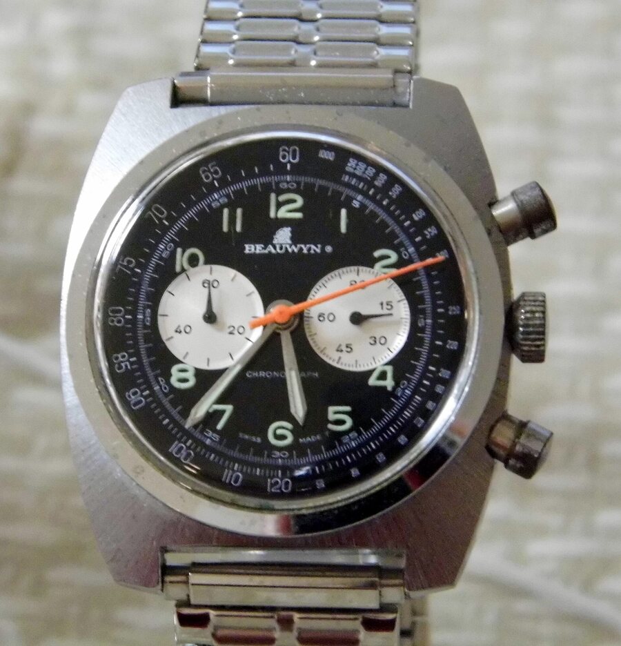 A vintage steel manual-wind chronograph with two sub-registers