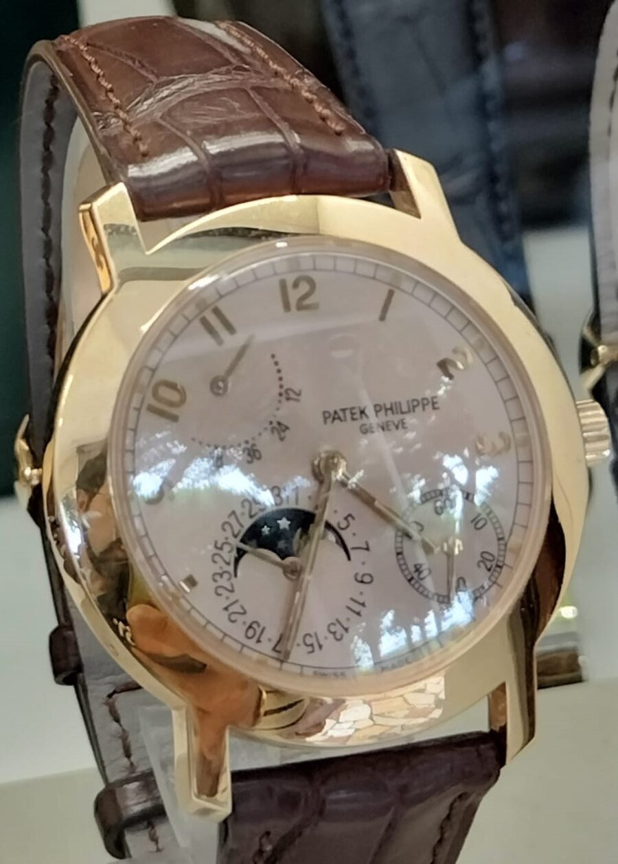 A Patek Philippe wristwatch with moon phase and calendar indications