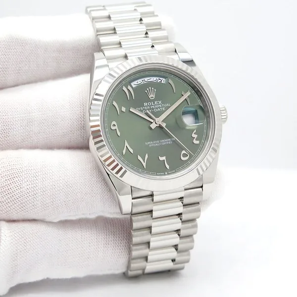 Rolex Rolex Day-Date 4040mm Platinum Ice Blue Roman Dial 228236, Price & Market Data