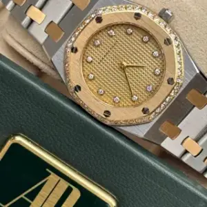 Audemars Piguet Audemars Piguet Royal Oak Lady 6007SA OAK 26mm Yellow gold and Stainless steel Champagne