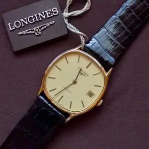 Longines Longines Presence 994.4197 32mm Yellow gold Champagne