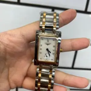 Longines Longines DolceVita L5.502.5.71.7 Rose gold and Stainless steel Silver