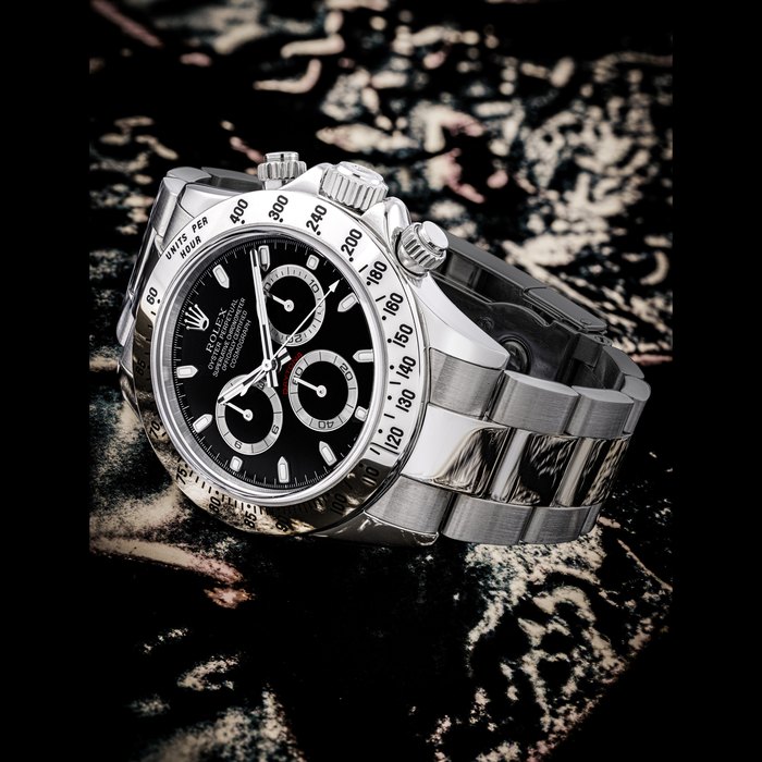 Rolex ROLEX. A STAINLESS STEEL AUTOMATIC CHRONOGRAPH WRISTWATCH WITH BRACELET DAYTONA MODEL, REF. 116520, CASE NO. F427156, Price & Market Data