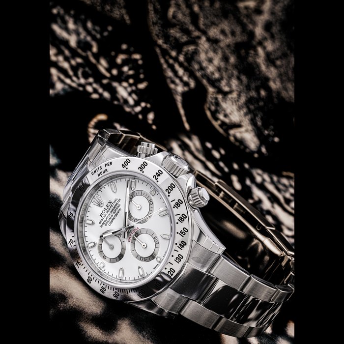 ROLEX. A STAINLESS STEEL AUTOMATIC CHRONOGRAPH WRISTWATCH WITH BRACELET DAYTONA MODEL, REF. 116520, CASE NO. 883650H3, CIRCA 2018