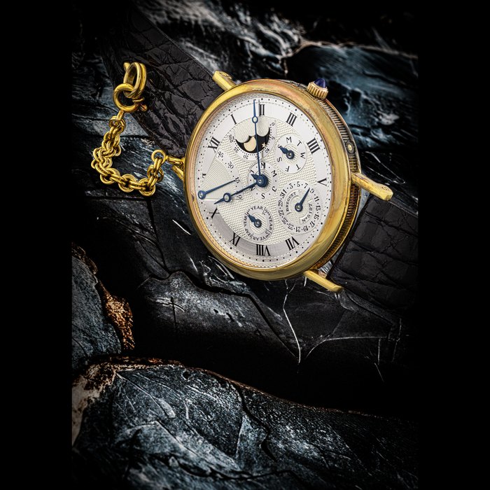 BREGUET. AN ATTRACTIVE 18K GOLD AUTOMATIC PERPETUAL CALENDAR WRISTWATCH WITH MOON PHASES, LEAP YEAR AND POWER RESERVE INDICATION REF. BA3310, CASE NO. 5127