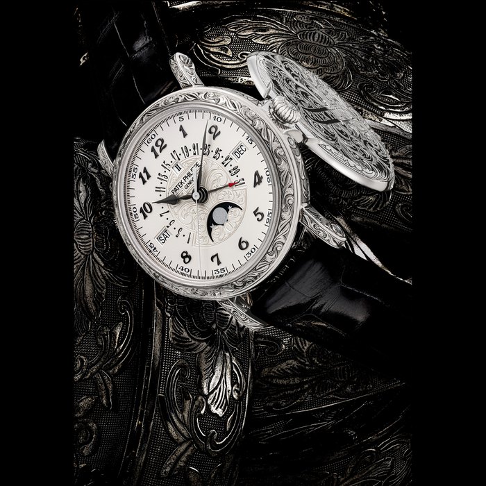 PATEK PHILIPPE. A RARE 18K WHITE GOLD AUTOMATIC PERPETUAL CALENDAR WRISTWATCH WITH SWEEP CENTRE SECONDS, RETROGRADE DATE, MOON PHASES, LEAP YEAR INDICATION AND BREGUET NUMERALS REF. 5160G/500G-001, MOVEMENT NO. 7’471’204, CASE NO. 6’487’571, CIRCA 2022