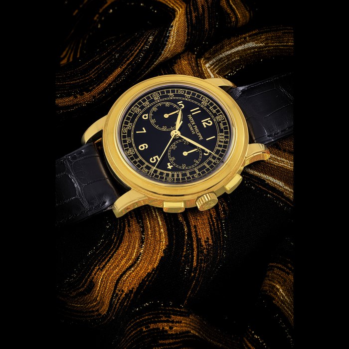 PATEK PHILIPPE. AN ATTRACTIVE 18K GOLD CHRONOGRAPH WRISTWATCH REF. 5070J, MOVEMENT NO. 3’146’220, CASE NO. 4’052’591, CIRCA 1999