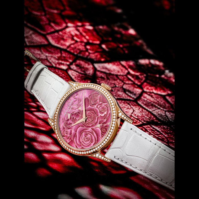 PATEK PHILIPPE. AN ATTRACTIVE 18K PINK GOLD AND DIAMOND-SET AUTOMATIC WRISTWATCH WITH CLOISONNÉ ENAMEL DIAL DEPECTING FUCHSIAS ROSES REF. 5077/100R-017, MOVEMENT NO. 5’929’832, CASE NO. 4’659’485, CIRCA 2017