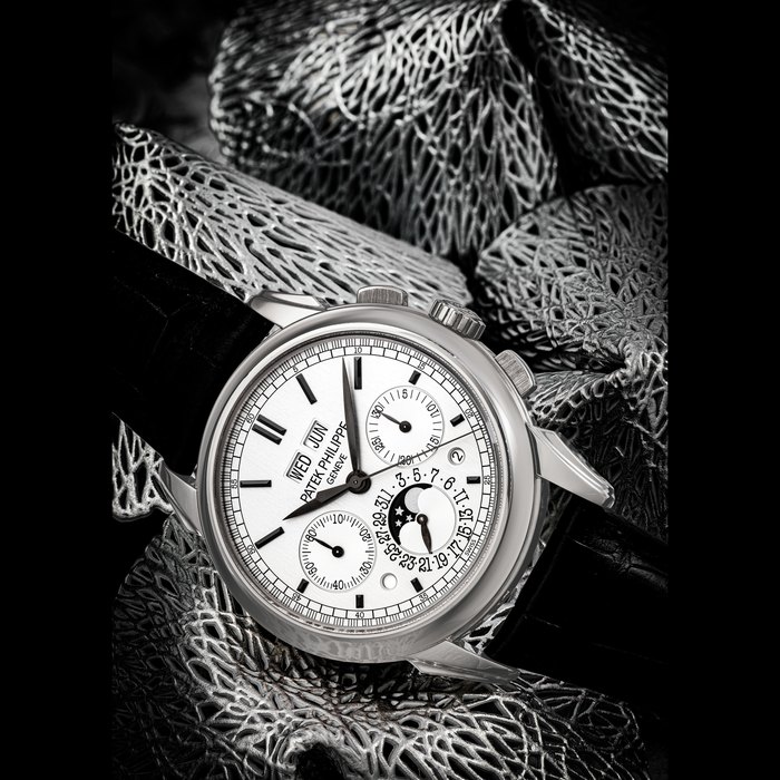 Patek Philippe PATEK PHILIPPE. AN 18K WHITE GOLD PERPETUAL CALENDAR CHRONOGRAPH WRISTWATCH WITH MOON PHASES, LEAP YEAR AND DAY/NIGHT INDICATION REF. 5270G-001, MOVEMENT NO. 5’626’690, CASE NO. 4’548’679, MANUFACTURED IN 2011, Price & Market Data