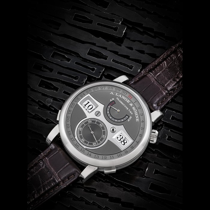 A. LANGE & SÖHNE. AN 18K WHITE GOLD WRISTWATCH WITH DIGITAL TIME DISPLAY, DATE AND POWER RESERVE ZEITWERK DATE MODEL, REF. 148.038, CASE NO. 252’783, CIRCA 2022