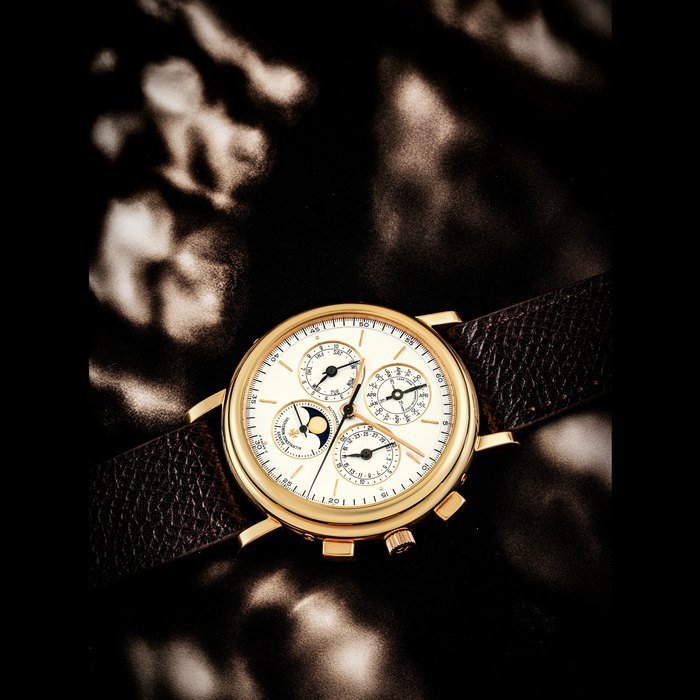 Vacheron Constantin VACHERON CONSTANTIN. AN 18K GOLD AUTOMATIC PERPETUAL CALENDAR CHRONOGRAPH WRISTWATCH WITH MOON PHASES AND LEAP YEAR INDICATION REF. 49005, CASE NO. 641’670