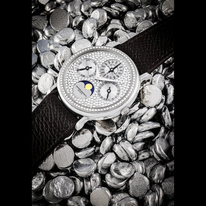 Vacheron Constantin VACHERON CONSTANTIN. A RARE AND D AZZLING PLATINUM AND DIAMOND-SET AUTOMATIC PERPETUAL CALENDAR WRISTWATCH WITH MOON PHASES AND LEAP YEAR INDICATION REF. 43531, CASE NO. 595’832, MANUFACTURED IN 1990